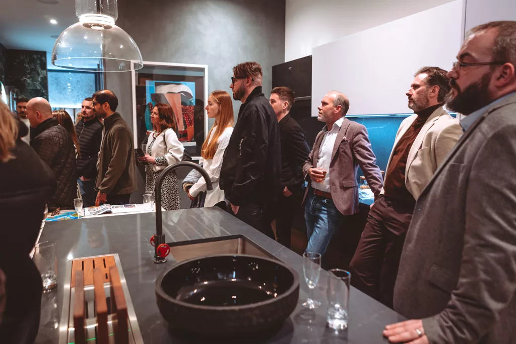An awards event, people listening to a speech