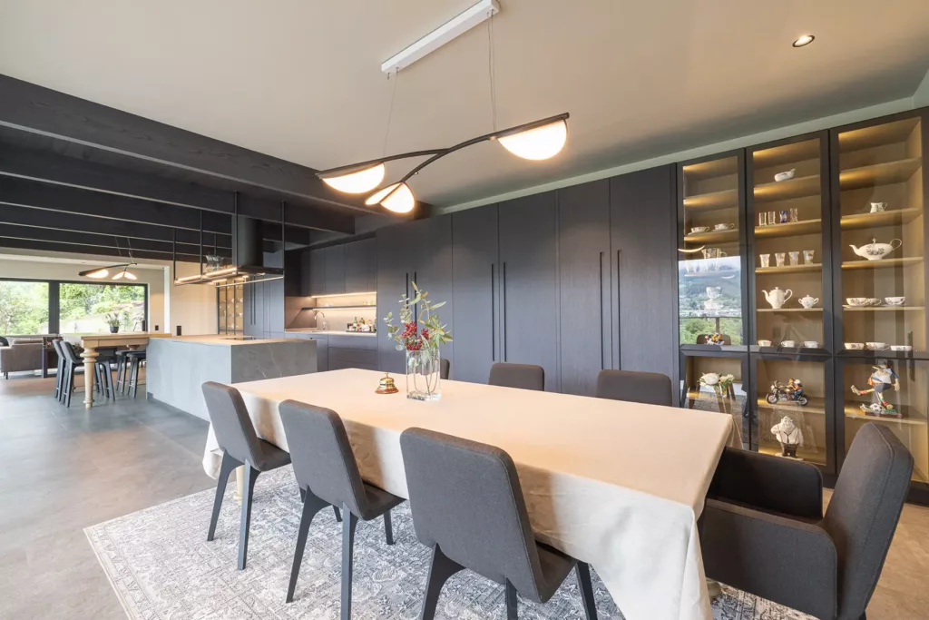 Modern grey kitchen with large dining table